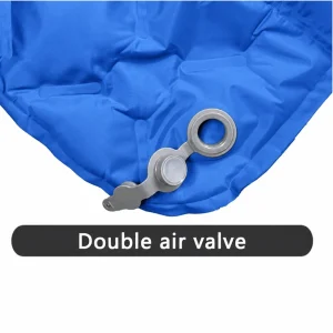Blue hiking sleeping mat close-up showing the double air valve for inflation and deflation