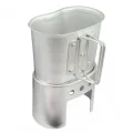 Silver cooking cup sitting on the canteen stove body against a white background