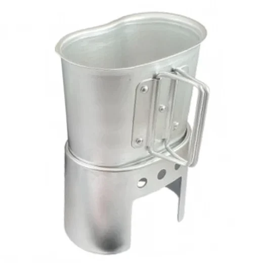 Silver cooking cup sitting on the canteen stove body against a white background