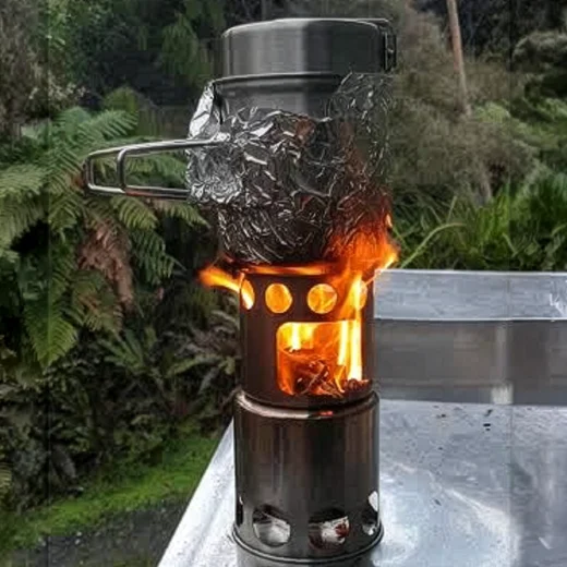 small wood buring stove used outside a nz doc hut