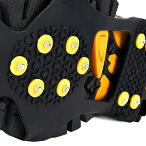 close of spikes on a hiking boot