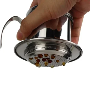 coffee dripping from maker