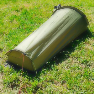 green vuno austere used outside on grass side angled shot