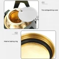 Alcohol stove burner with flame regulation cover and internal sealing ring shown in close-up