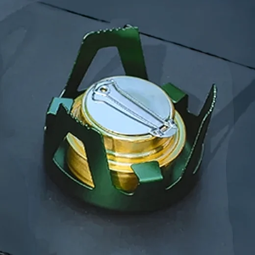 Alcohol stove with flame extinguishing cover fitted over the burner inside the metal support