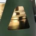 Close-up of the hollow cut-out design in the alcohol stove support around the burner