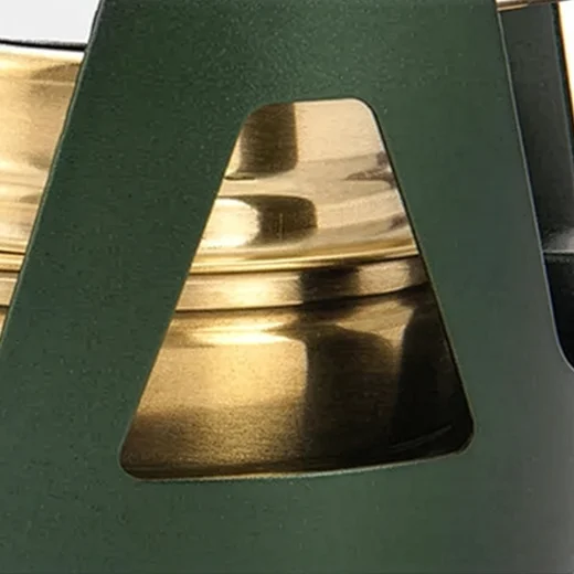 Close-up of the hollow cut-out design in the alcohol stove support around the burner