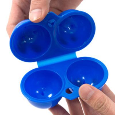 blue 2 egg container open in hand