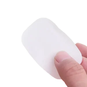dry soap flake held in hand