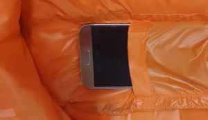 Phone pocket for phone storage in sleeping bag