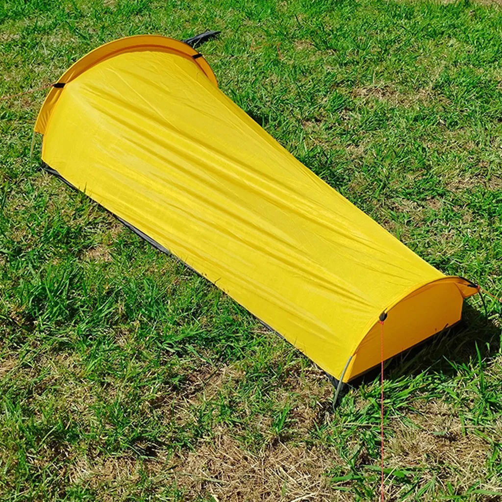 left rear angled view of yellow vuno bivy bag
