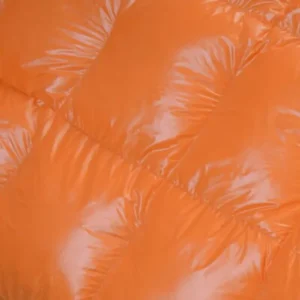 square baffle close up of orange down sleeping bag