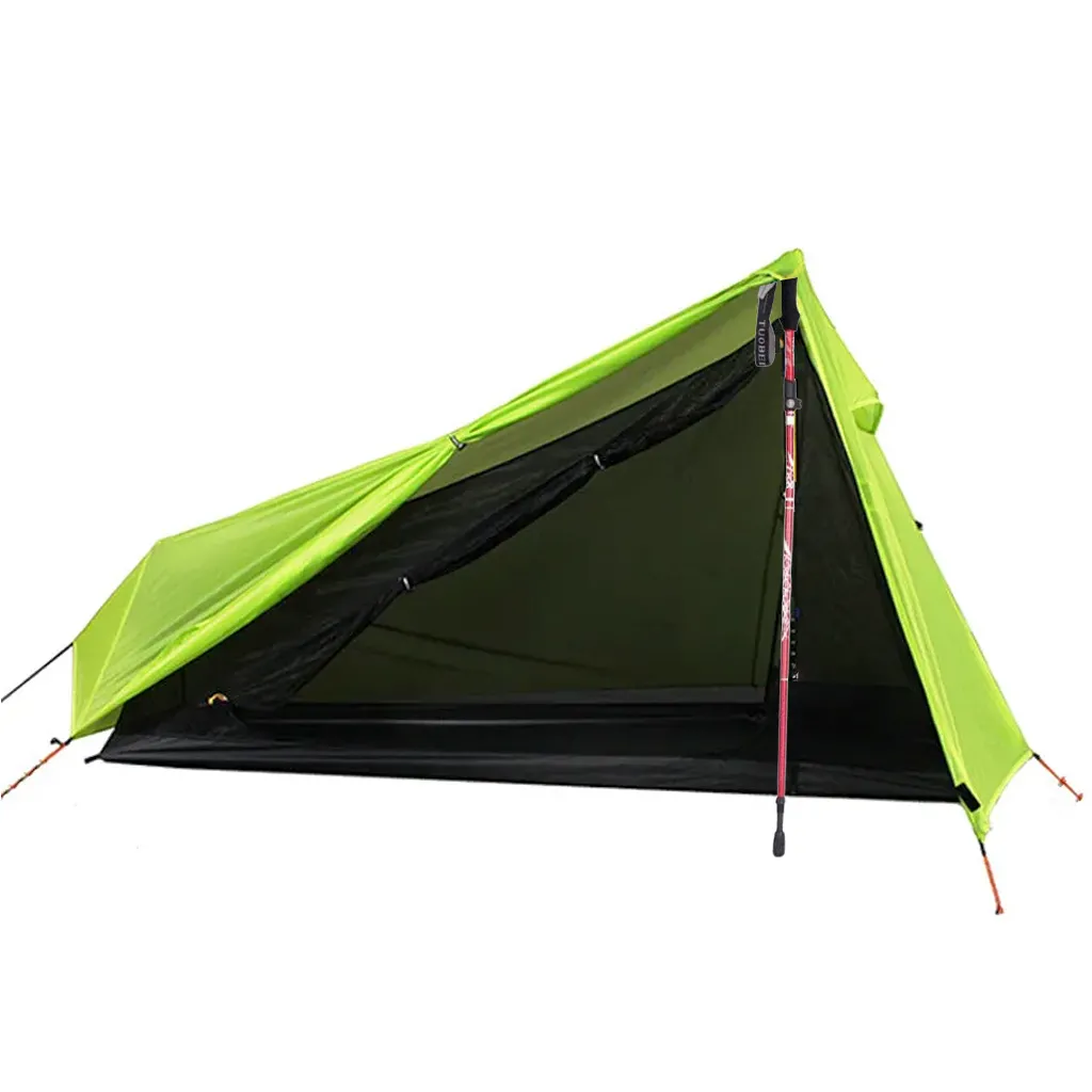 green tent with red hiking pole