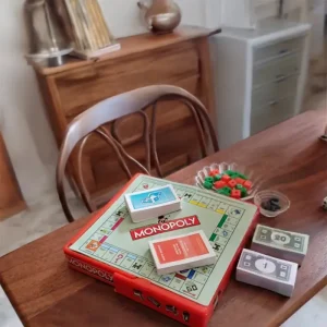 mini monopoly board setup on a table
