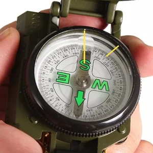 close up of lensatic compass dial