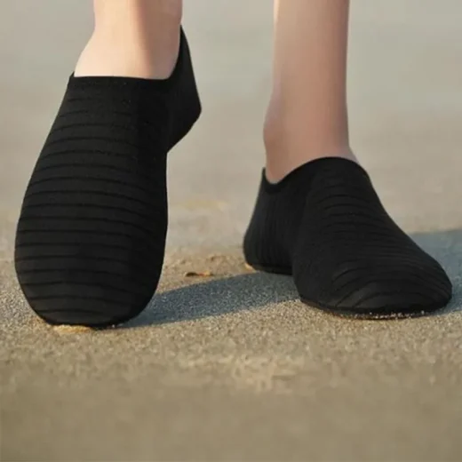 wearing aqua socks on sand