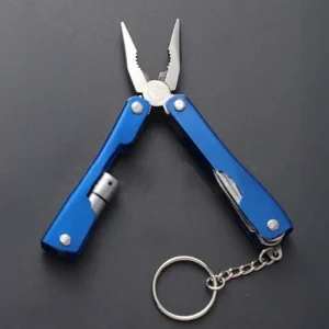 small pliers multi tool with a dark background
