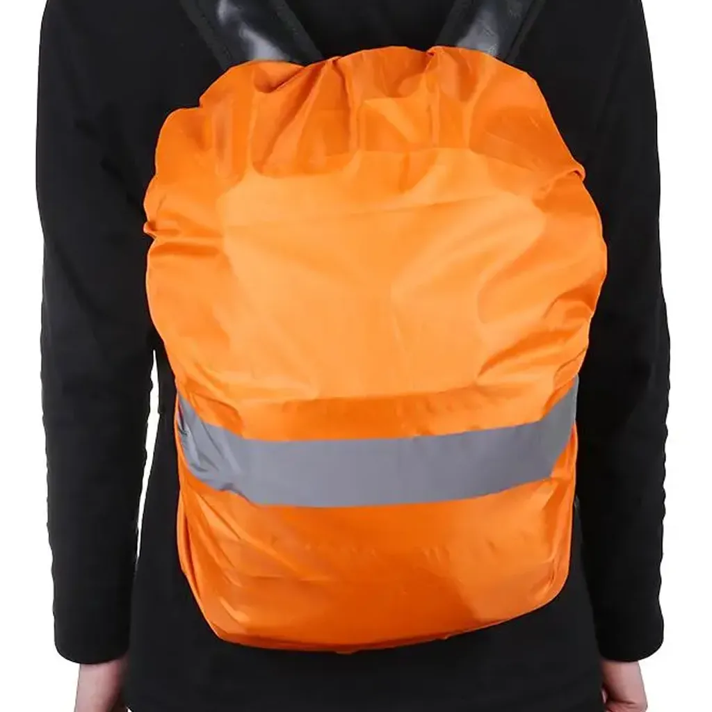 backpack with orange raincover on a models bag to demonstrate the covers size of 20 litres