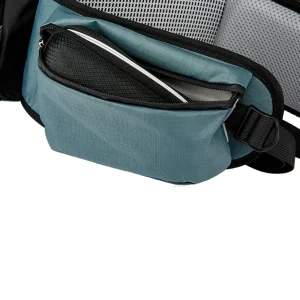 Close up of a padded hip belt zip pocket for storing snacks, keys, or a small phone during a hike