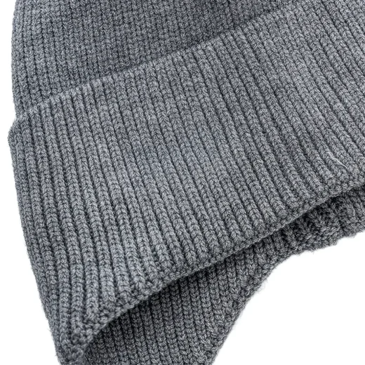 close up image of grey hat