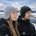 male and female models modelling beanies with ear flaps