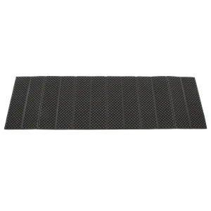 black underside of green foam cmaping mat