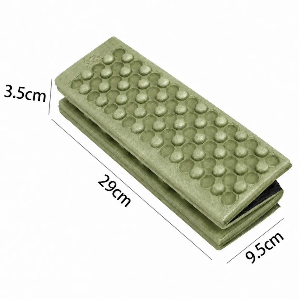 Army green outdoor seat pad folded to 29 cm by 9.5 cm by 3.5 cm for compact packing