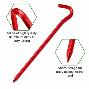 Close view of red aluminium tent stake with pointed tip for ground placement