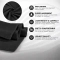 Close-up of the black Vuno microfibre towel showing its soft fabric and stitched edging.