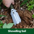 EDC Spade being used to shovel soil