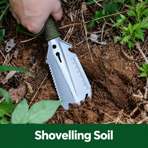 EDC Spade being used to shovel soil