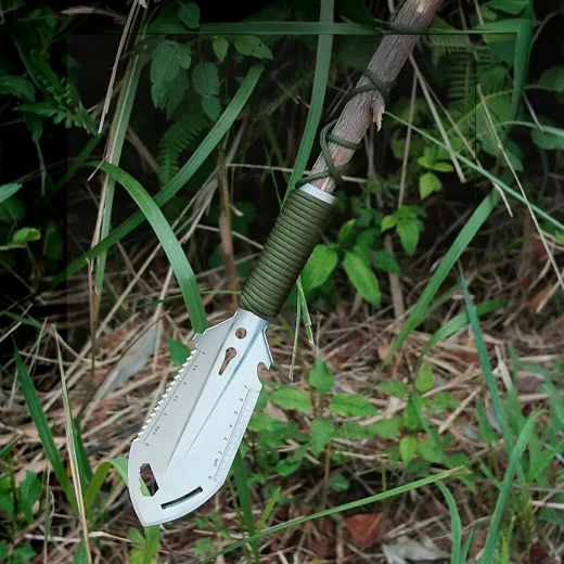 EDC shovel with a branch being used as the handle