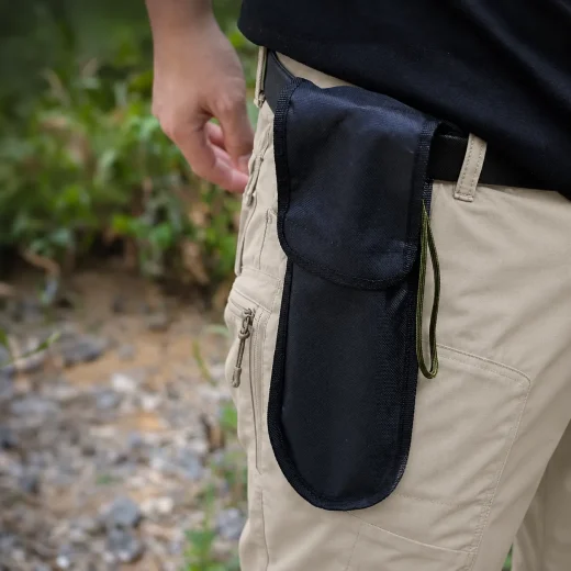 spade store in a pouch attached to a belt